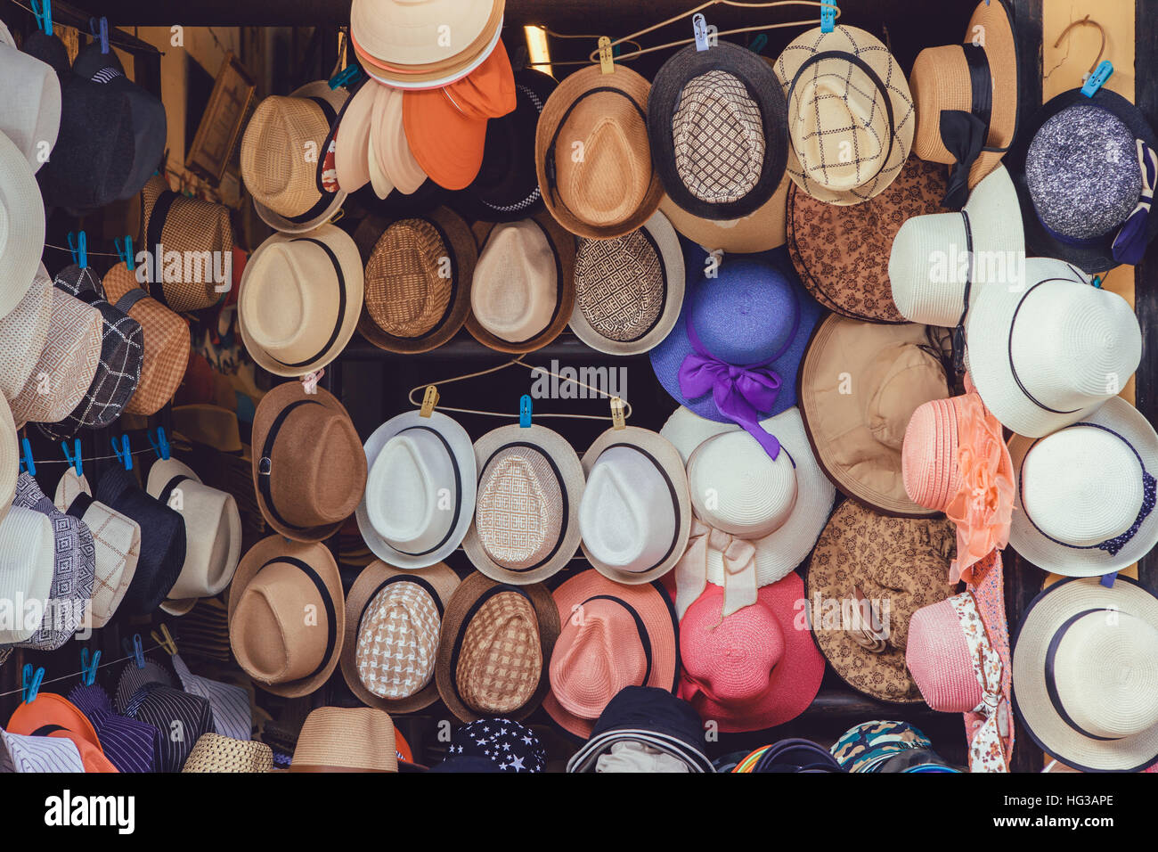 Various hats collection hanging on souvenir shop Stock Photo Alamy