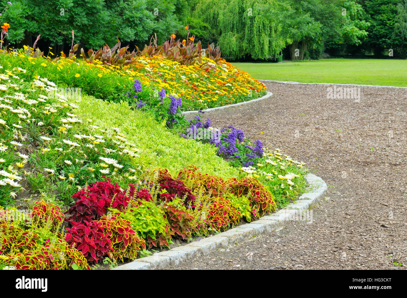 delightful flower bed in the summer park Stock Photo - Alamy