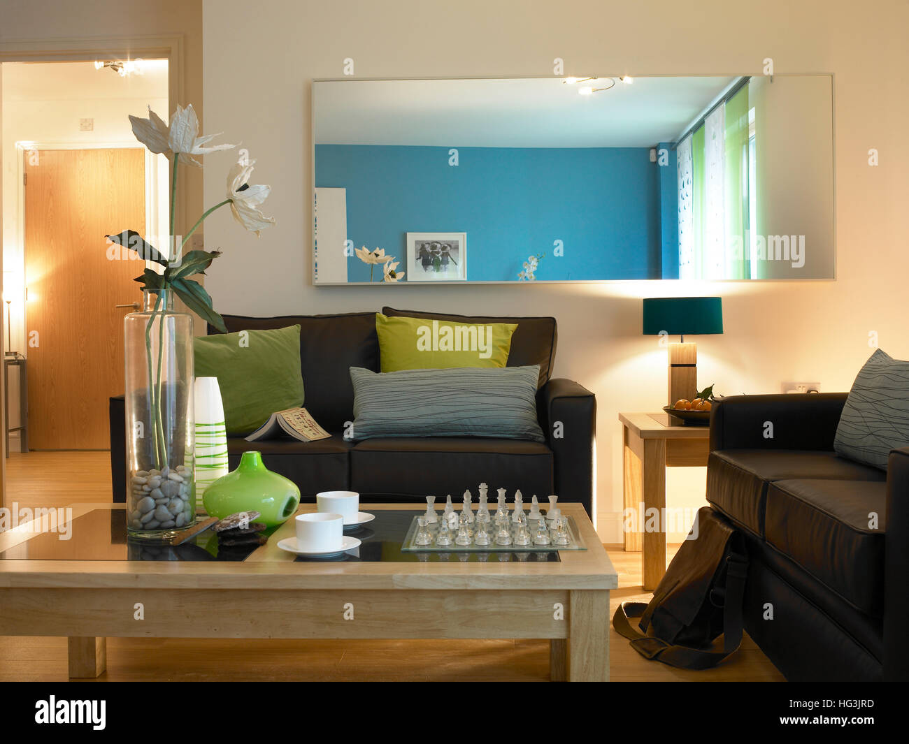 Living area with mirror Stock Photo Alamy