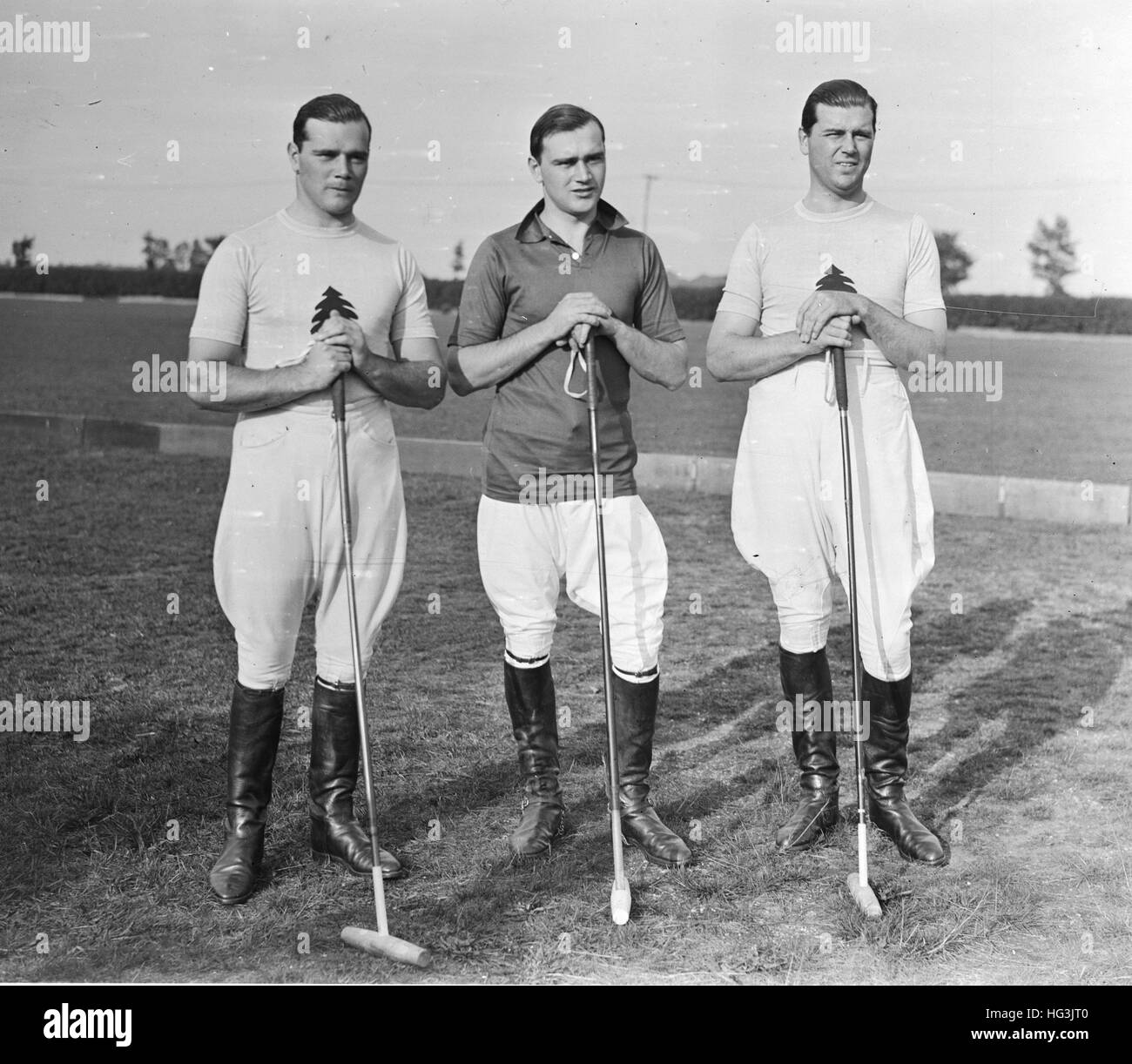 Polo players Ivor J Barney & Gerald Balding with unidentified teammate, Greentree Polo team, ca 1932 (credit: Bert Morgan Archive) Stock Photo