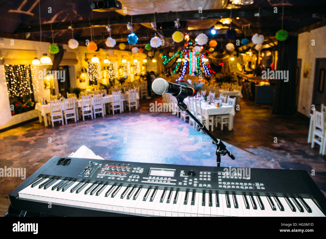 synthesizer and microphone on stage Stock Photo Alamy