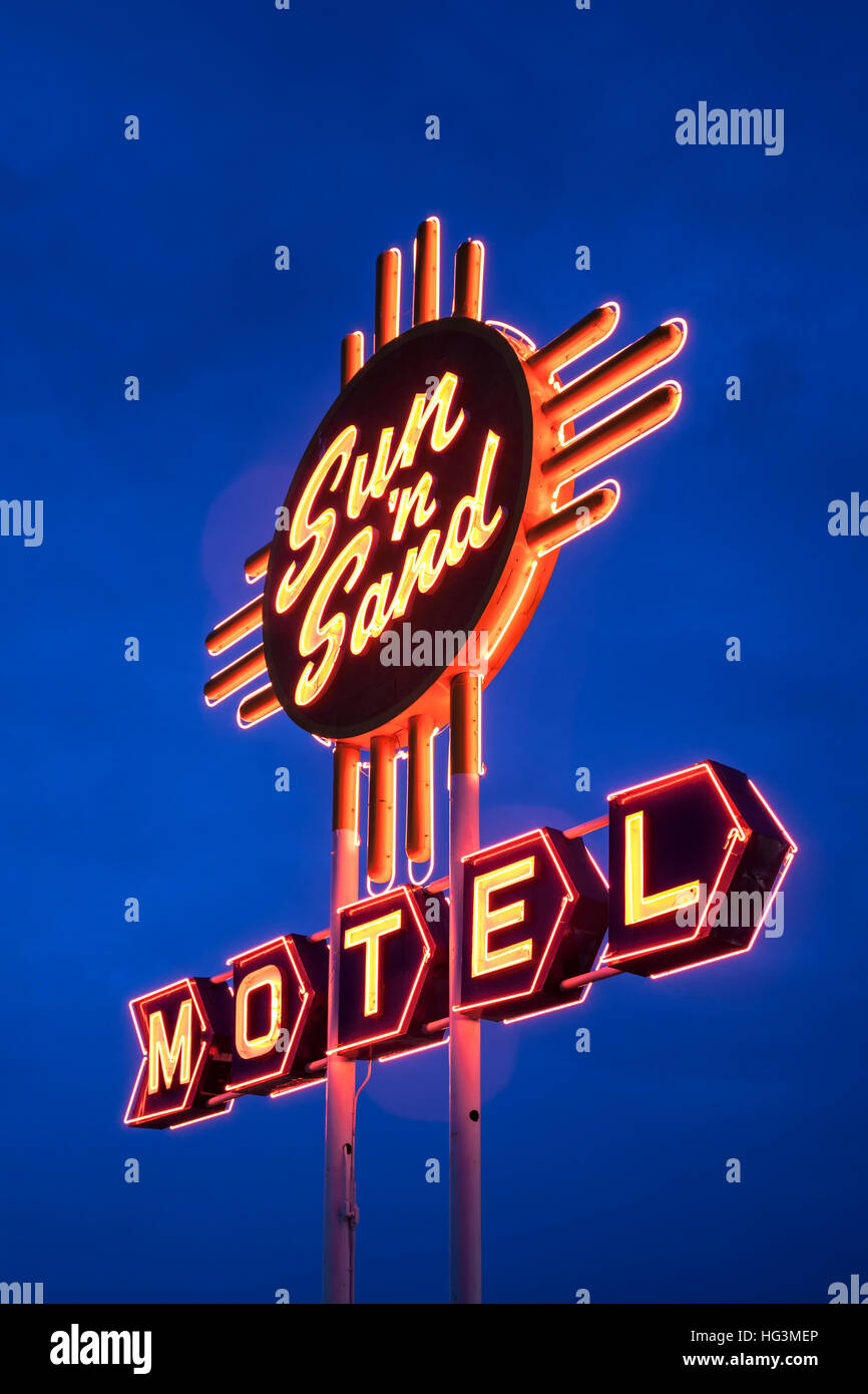 Sun 'n Sand Motel neon sign at twilight, Route 66, Santa Rosa, New Mexico USA Stock Photo