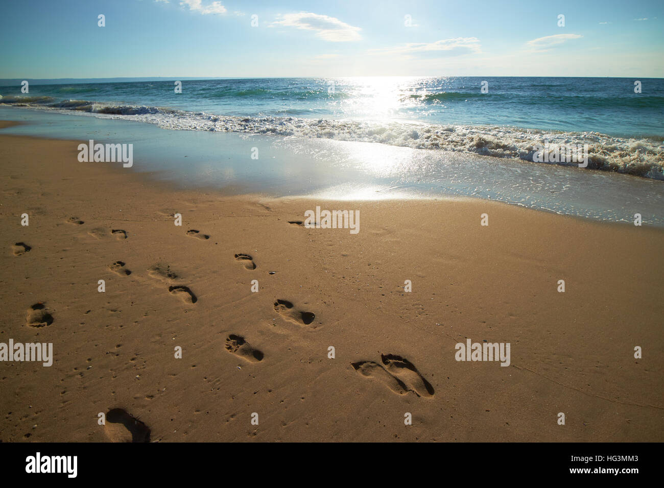 footprints in the sand on the beach Stock Photo - Alamy