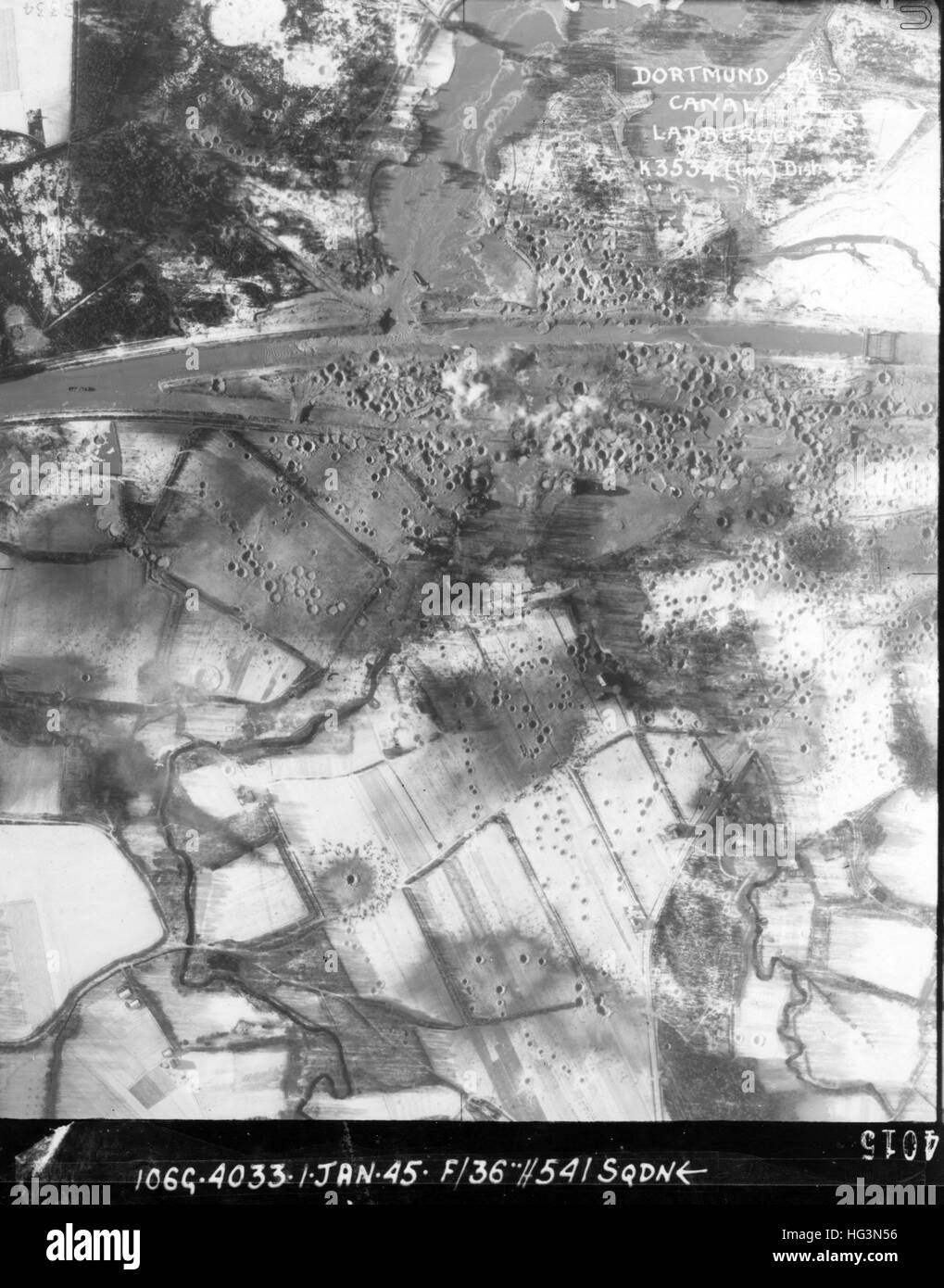 DORTMUND-EMS CANAL, Germany. Aerial reconnaissance photo by 541 Squadron RAF on 1 January 1945 showing bomb damage to the bridge at Ladbergen over the Dortmund-Ems Canal Stock Photo