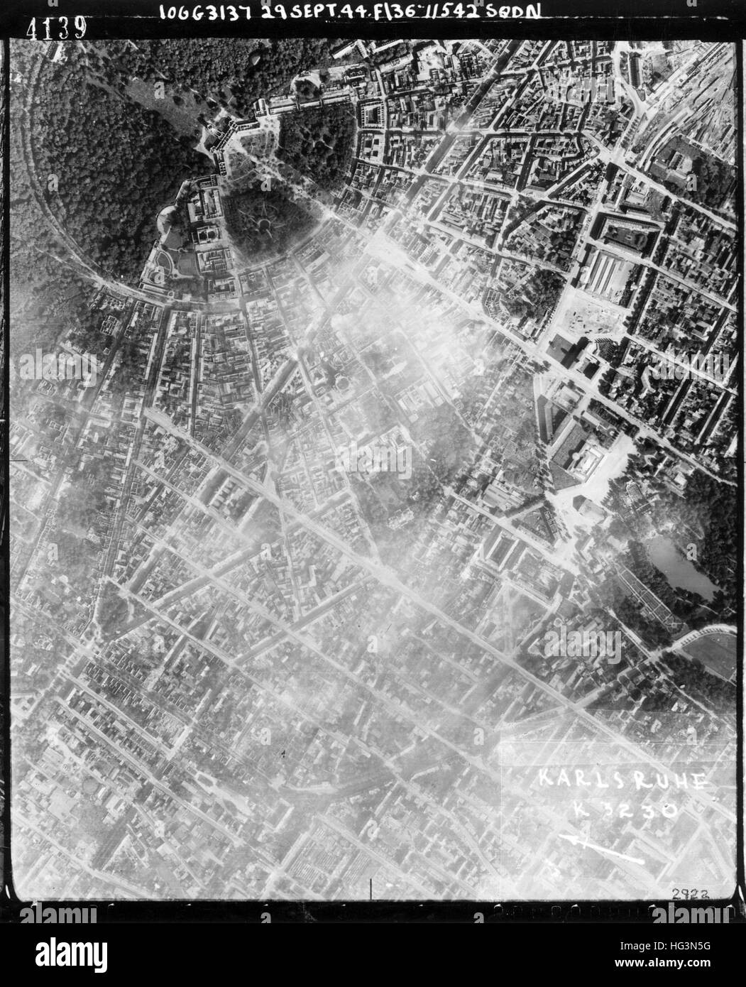 KARLSRUHE, Germany. Reconnaissance photo taken on 29 September from a Spitfire of 542 Squadron RAF showing bomb damage in the central area after the RAF bombing raid on 26 September 1944. Thin cloud obscuring part of the image. Stock Photo