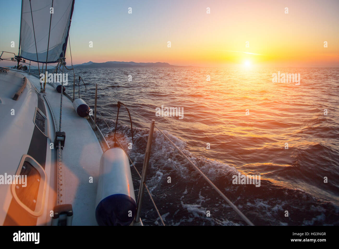 Sailing ship luxury yacht boat in the Sea at sunset Stock Photo - Alamy