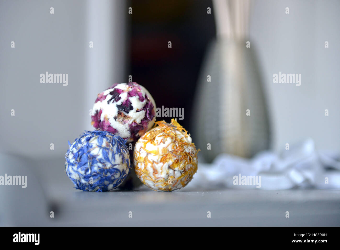 Bath bombs made with real flower petals in a bathroom Stock Photo Alamy