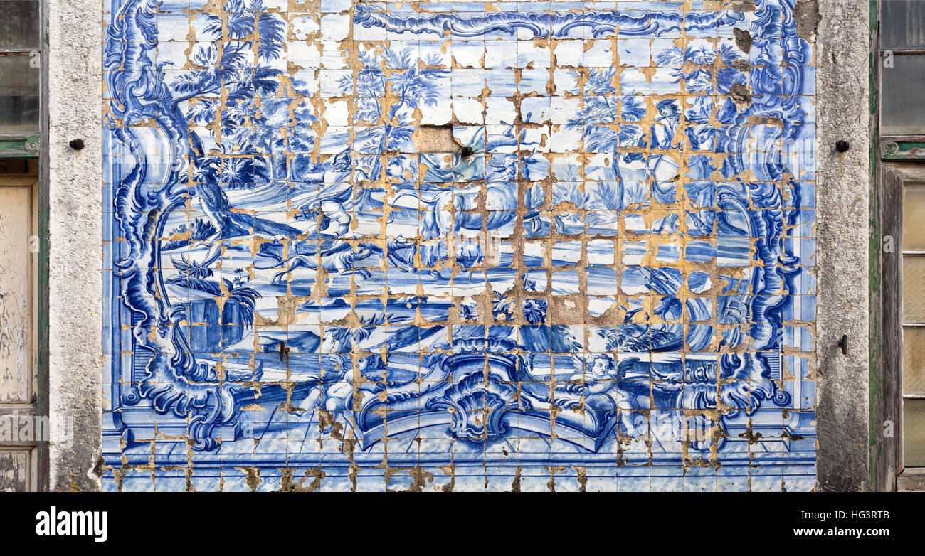 Detail of the highly degraded tiles decorating the facade wall of the ...