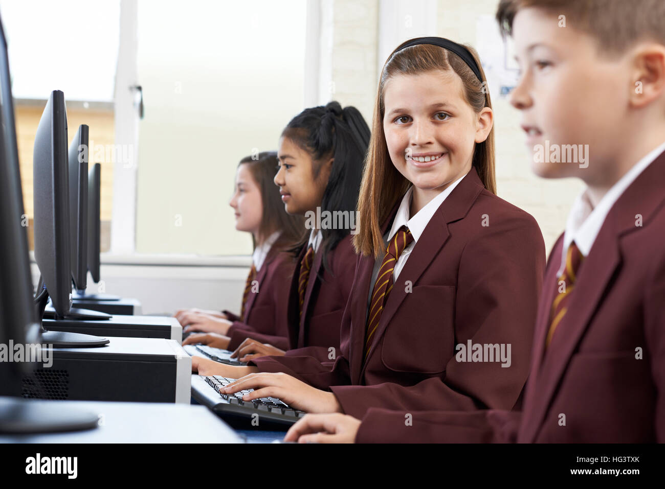 Computer school pupils uniform hi-res stock photography and images - Alamy