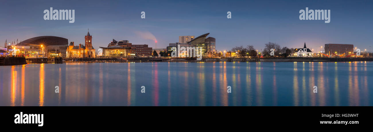 Cardiff Bay at night - Wales Millennium Centre, Pierhead building, Y Senedd (Welsh Assembly Building) and Norwegian Church in early evening, Cardiff B Stock Photo