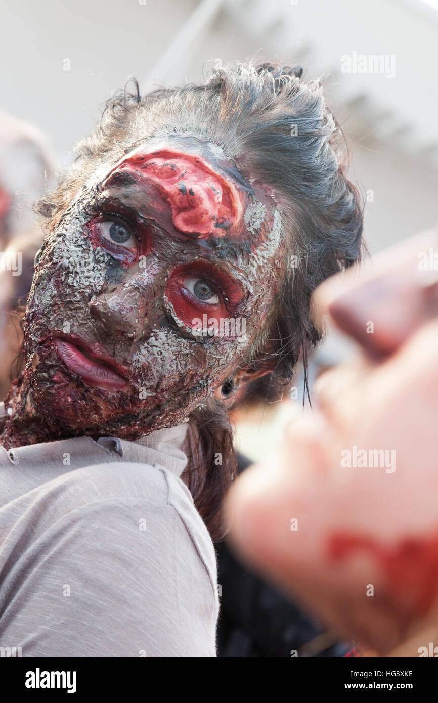Zombies walk on the boardwalk and through the streets of Asbury Park, NJ during the annual Zombie Walk on October 5, 2013. Stock Photo