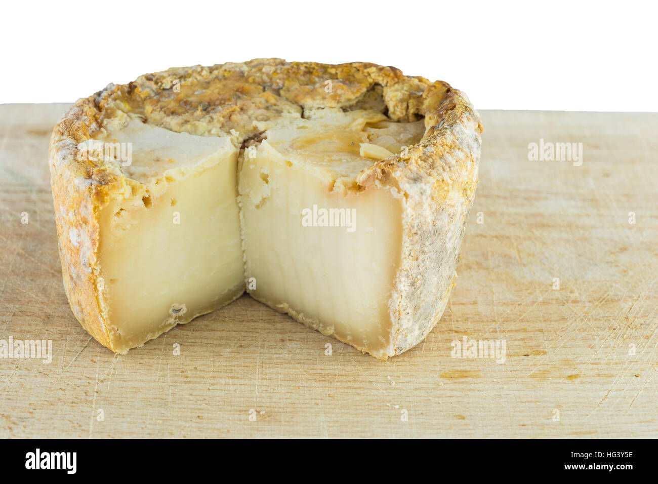 The form of hard cheese of a bloomy rind goat's milk, frost crust, treatment through special mold of the genus Penicillium, such as Penicillium camemb Stock Photo