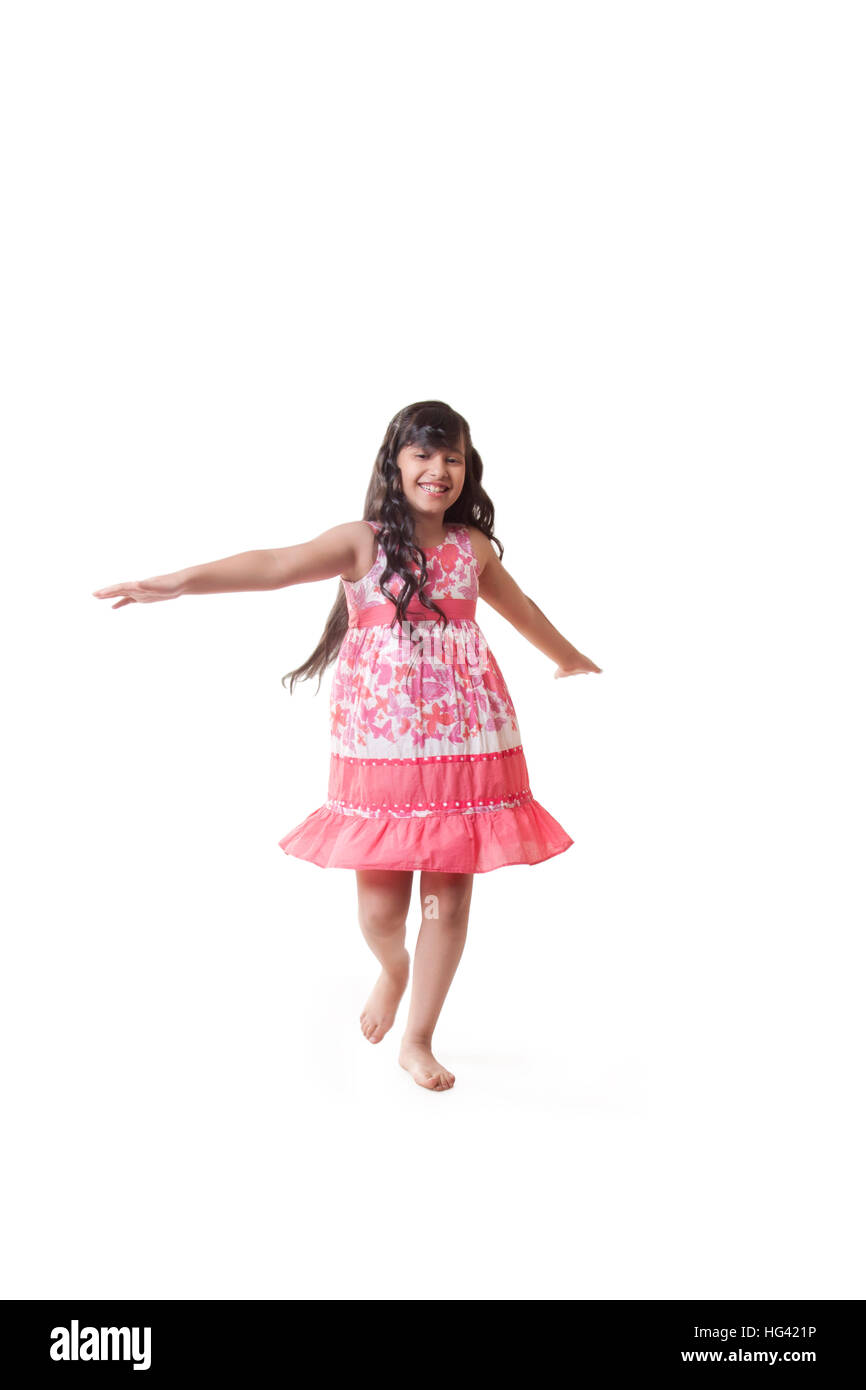 Portrait of cute girl dancing Stock Photo