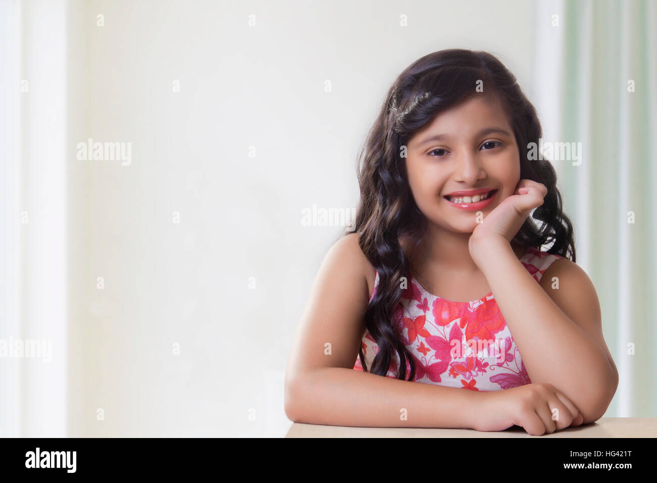 Portrait of cute girl smiling Stock Photo - Alamy