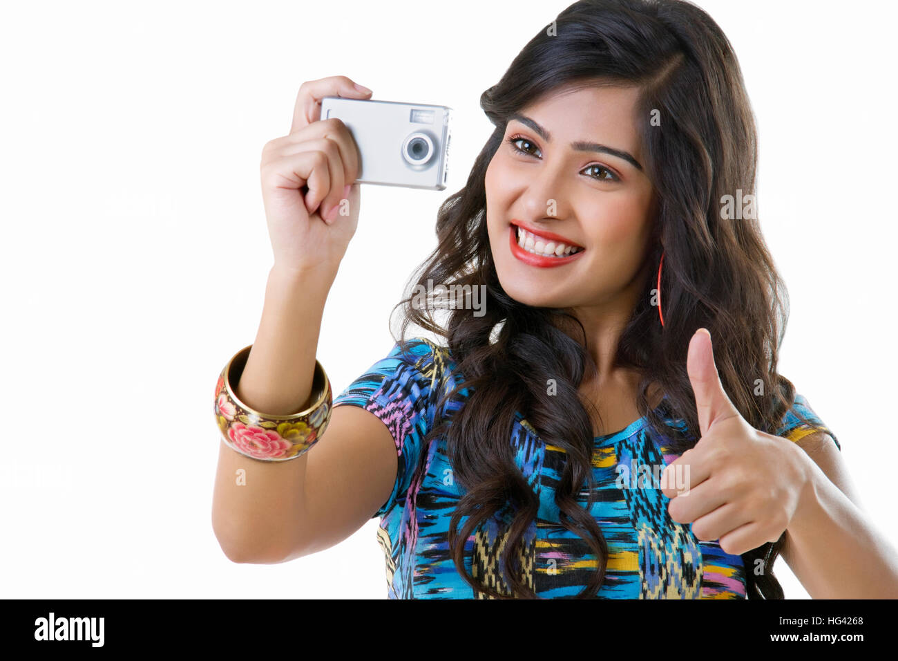 Indian woman showing thumbs up hi-res stock photography and images - Alamy