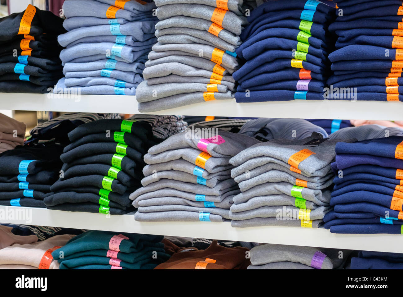 pullover / jumper display shelf in primark store Stock Photo