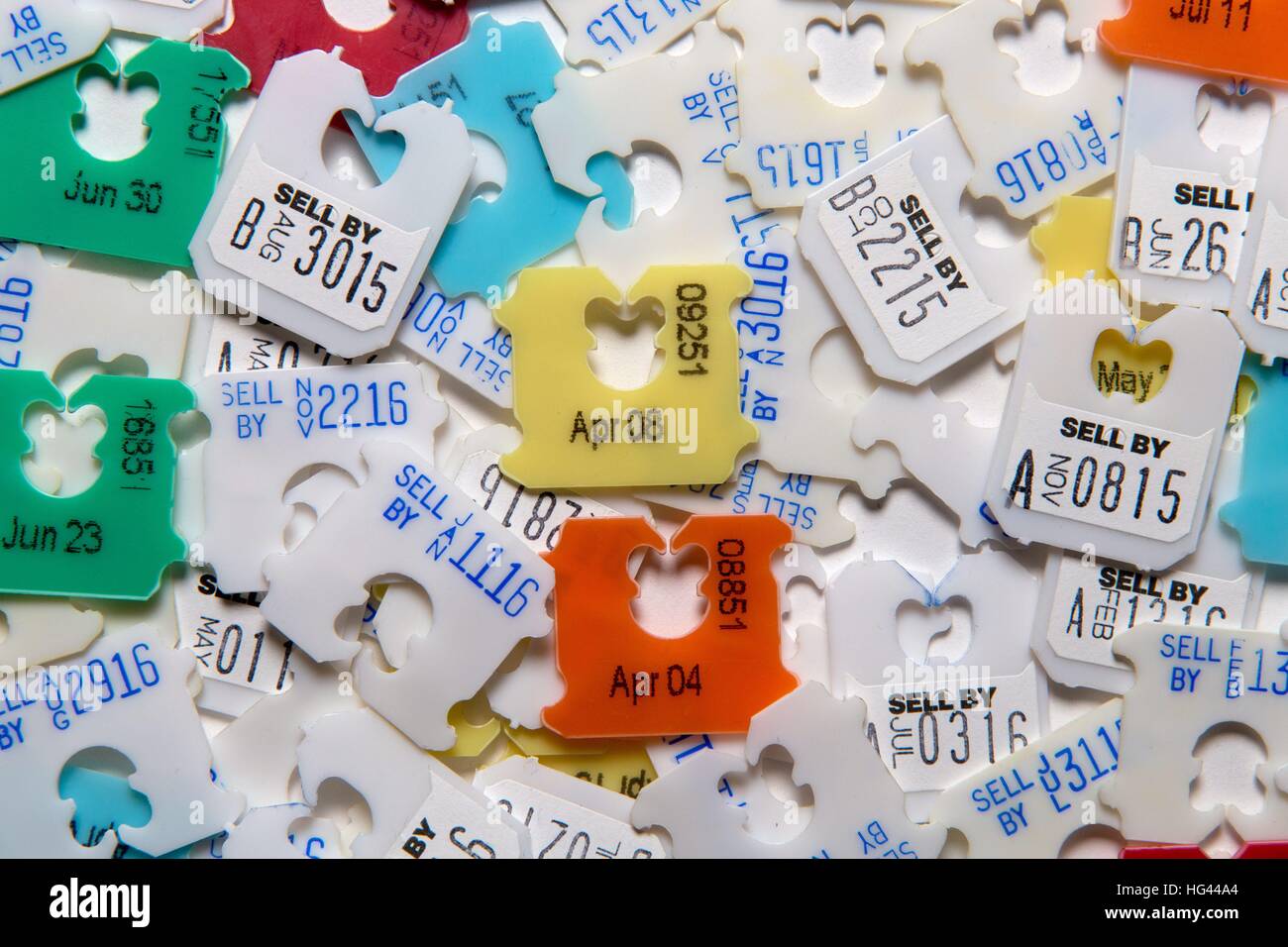 https://c8.alamy.com/comp/HG44A4/bread-clips-used-to-seal-plastic-bags-showing-expiration-dates-in-HG44A4.jpg