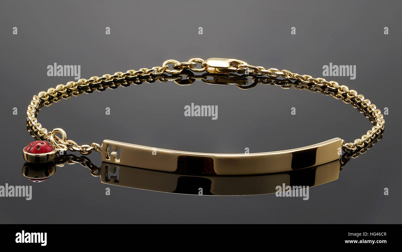 golden bracelet isolated on black background Stock Photo
