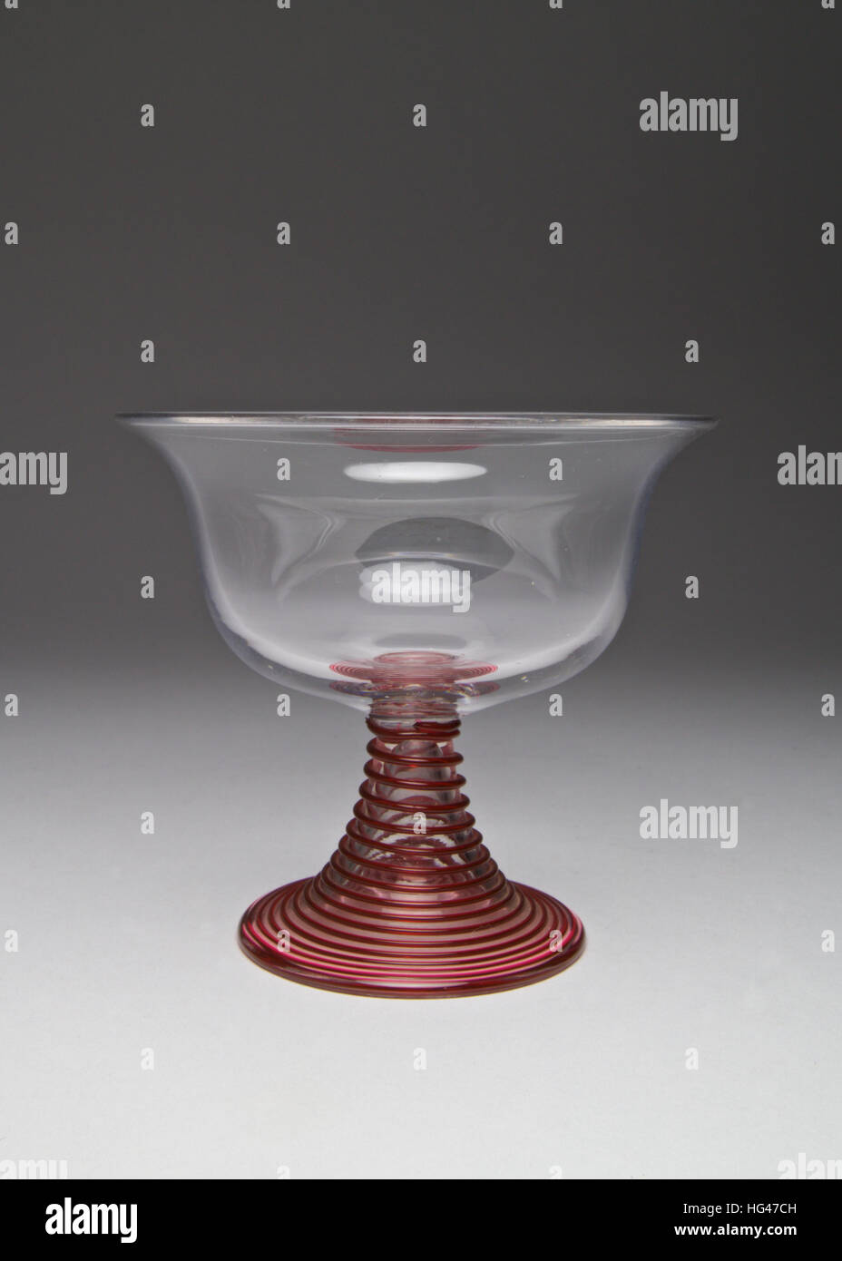 English Arts and Crafts glass, pedestal with applied red glass spiral, made circa 1900. The