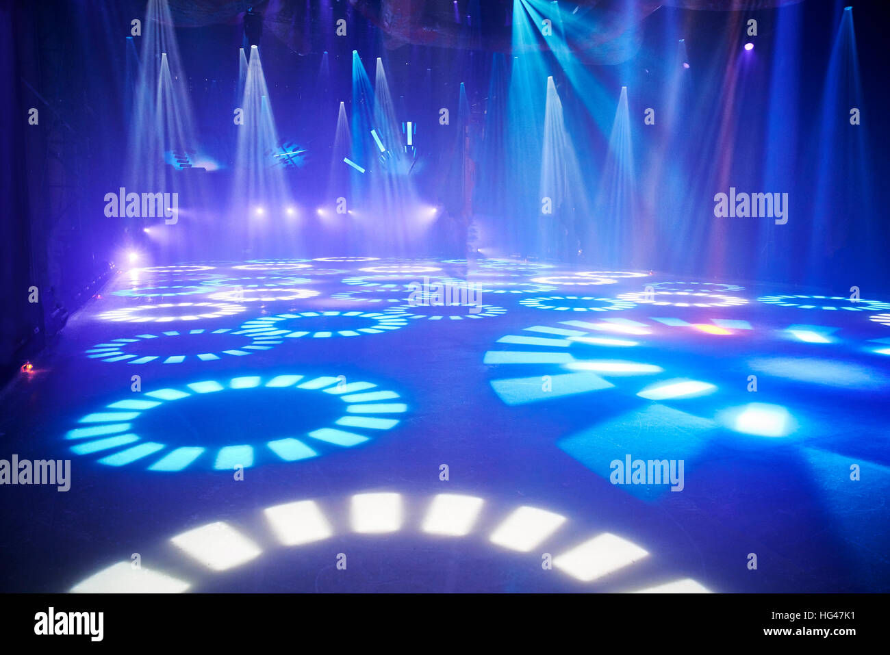 ice floor with stage spotlights for ice dancing. Stock Photo