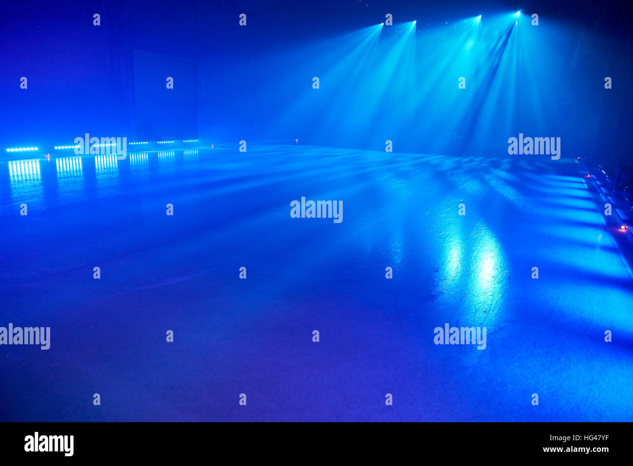 ice floor with stage spotlights for ice dancing. Stock Photo