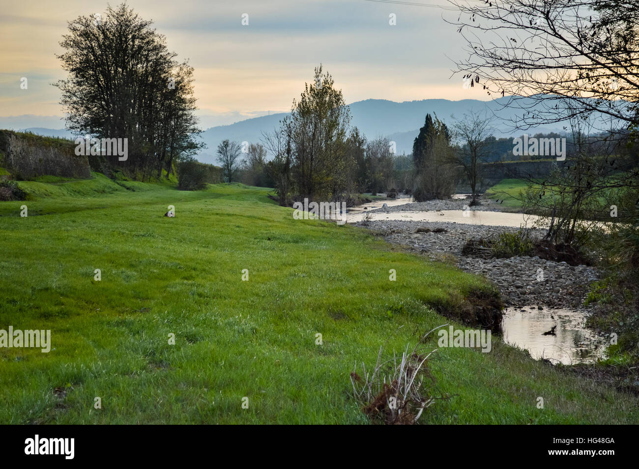 River Ombrone and its riverside at twilight, Pistoia, Tuscany. Stock Photo