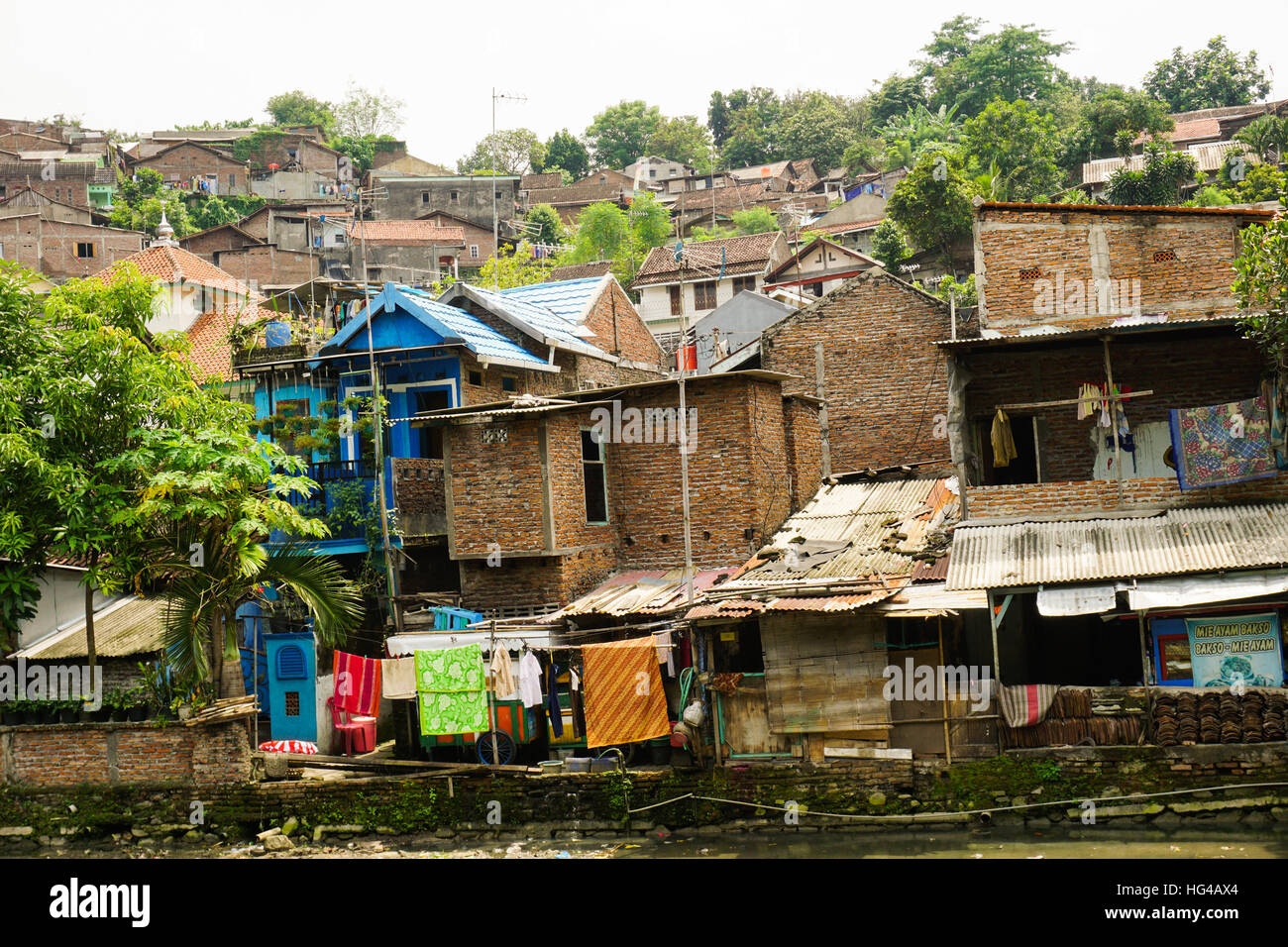 Slums with houses made from brick wall photo taken in Semarang ...