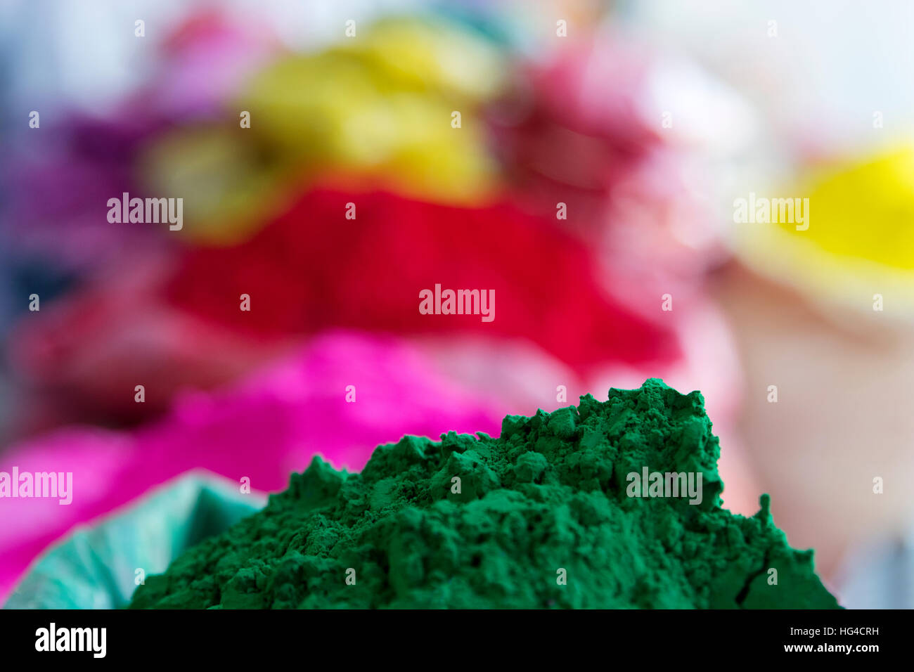 Holi festival color powder piles Stock Photo - Alamy