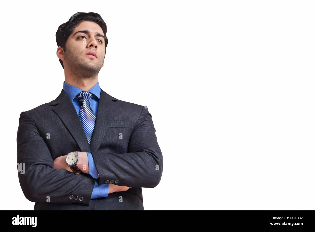 Portrait of young businessman with arms crossed Stock Photo - Alamy