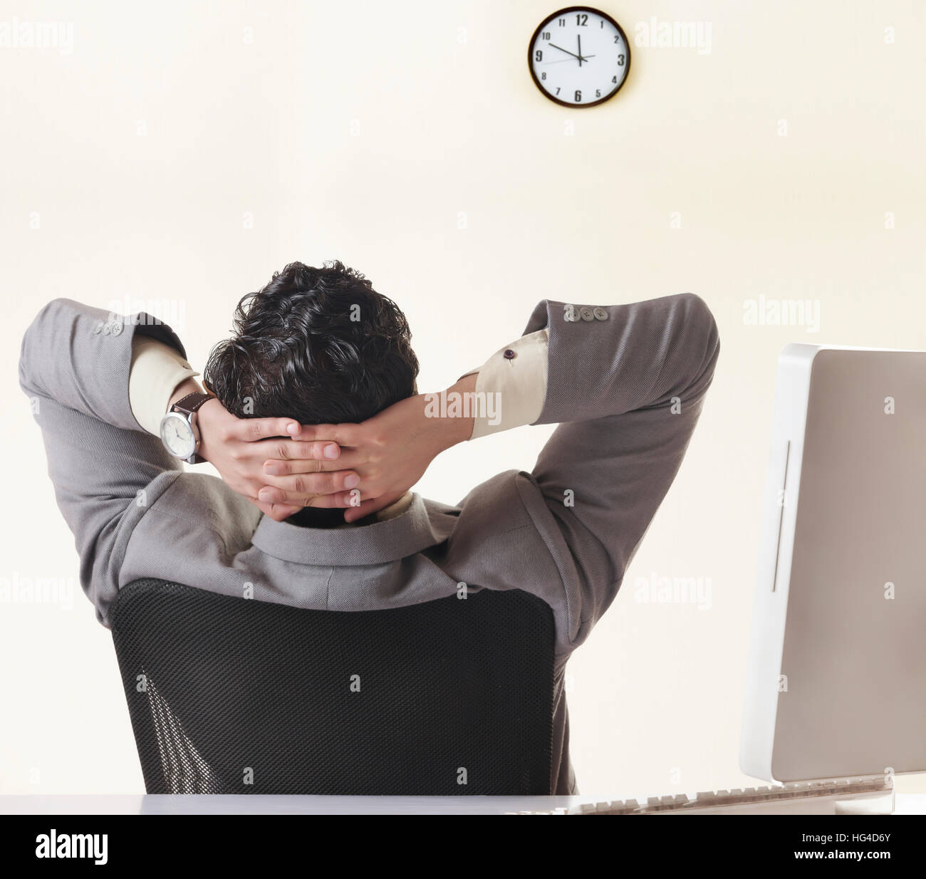 Man watching clock wall hi-res stock photography and images - Alamy