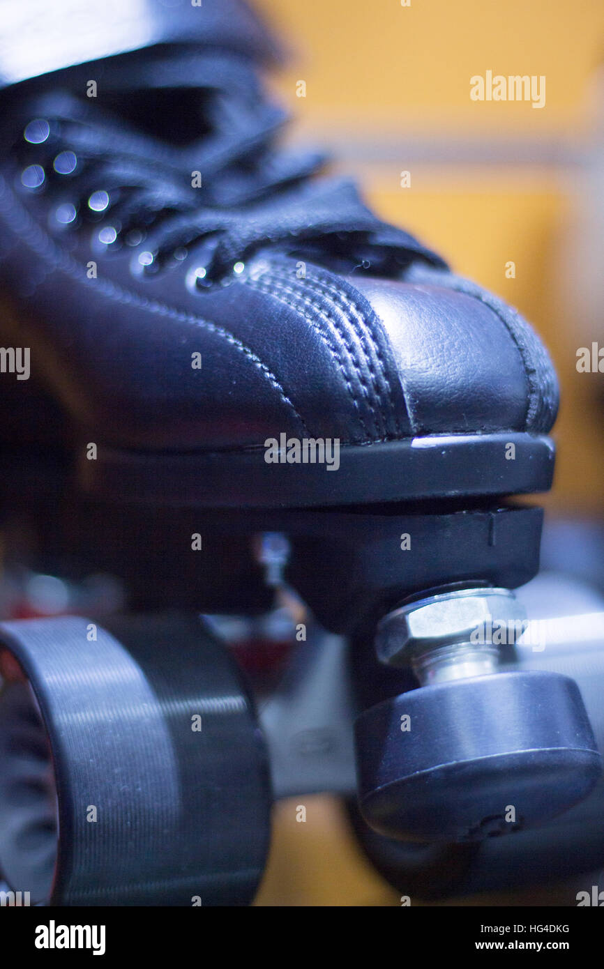 Quad skate rollerskates in skate store in shop window display. Skates