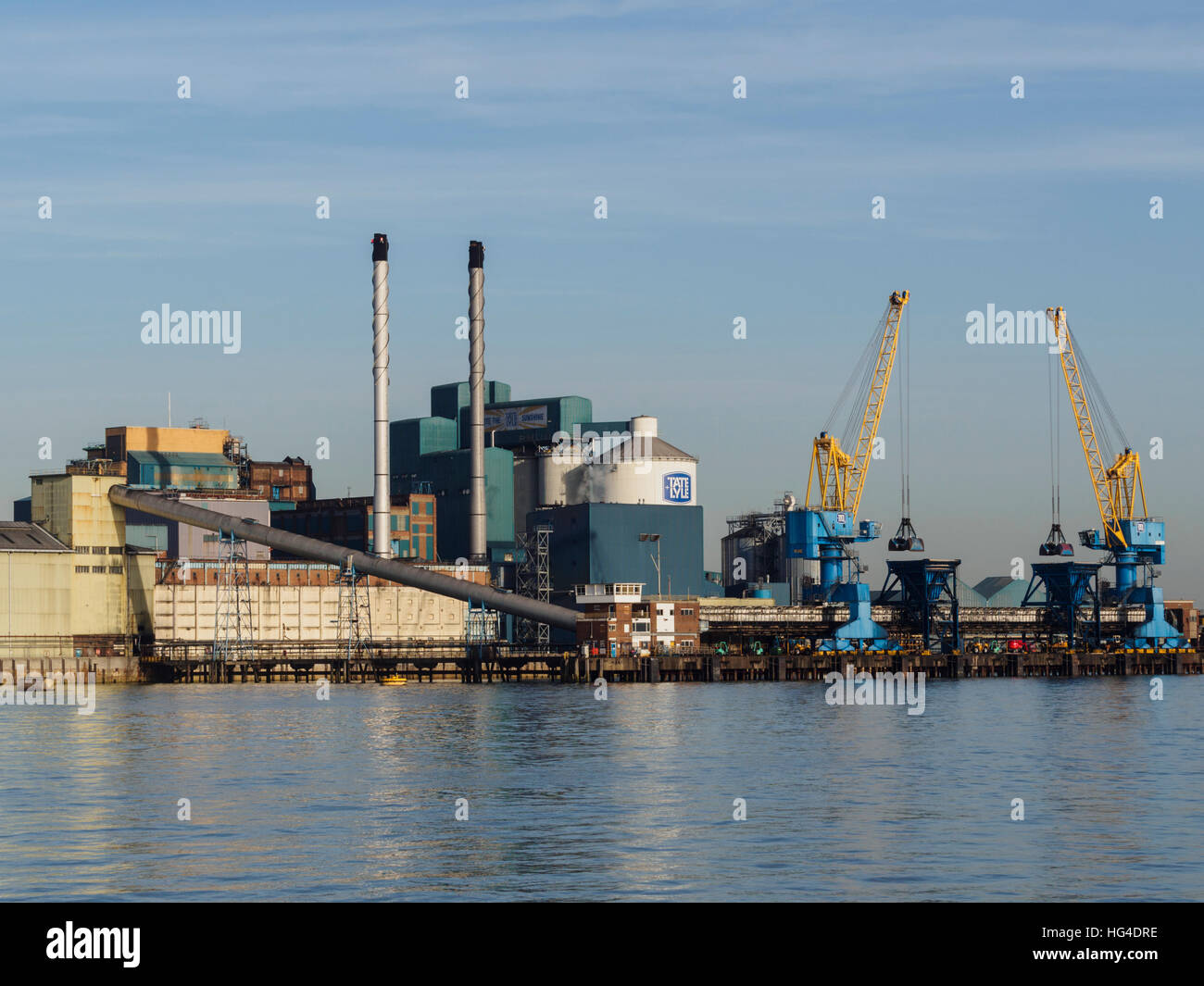 Tate and Lyle factory on the banks of the River Thames at Silvertown London Stock Photo