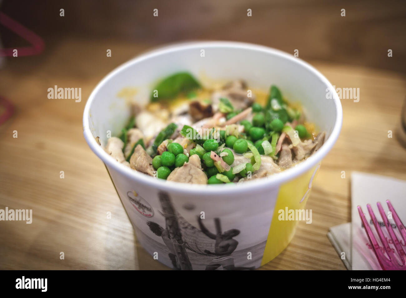 cardboard bowl of Thai chicken soup Stock Photo Alamy