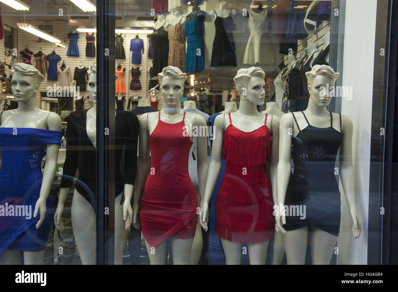 Dressed mannequins at a fashion outlet in the Garment District in Manhattan, NYC. Stock Photo