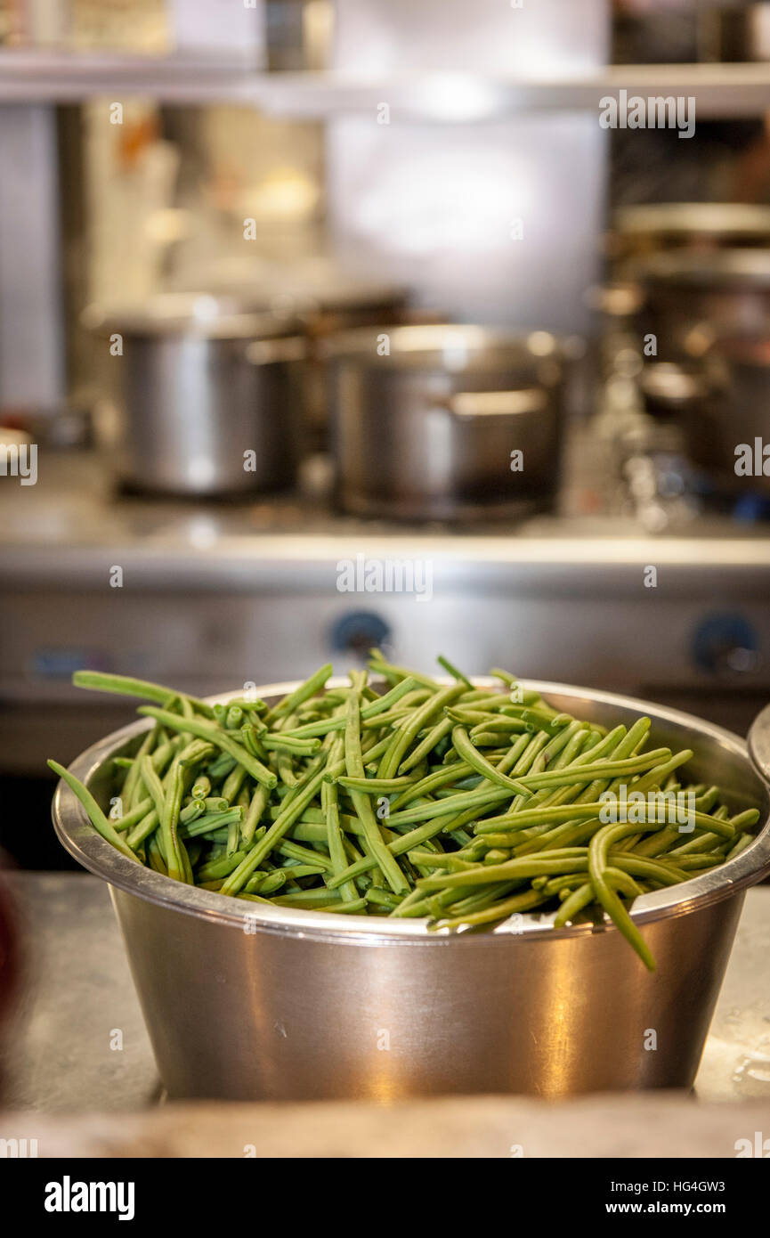 A big bowl of uncooked green beans topped and tailed Stock Photo