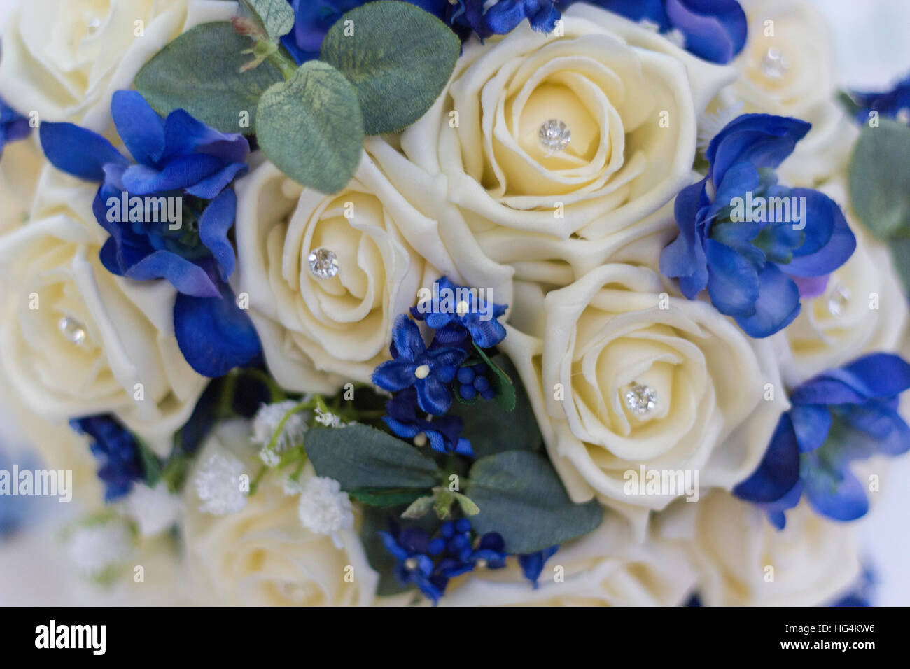 Wedding bouquet in blue and white with roses and diamantes Stock Photo