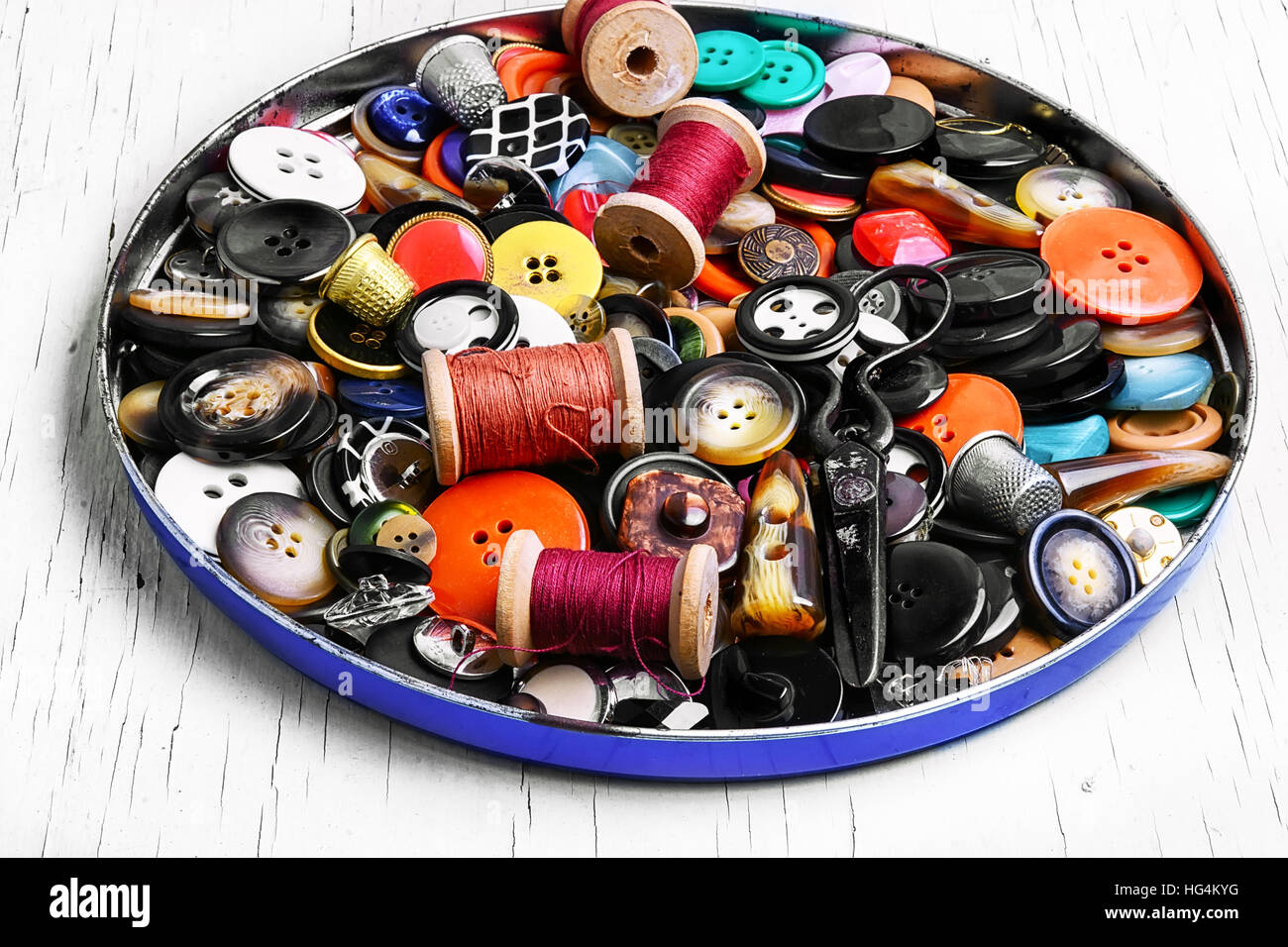Threads for sewing and a set of buttons from clothing Stock Photo - Alamy