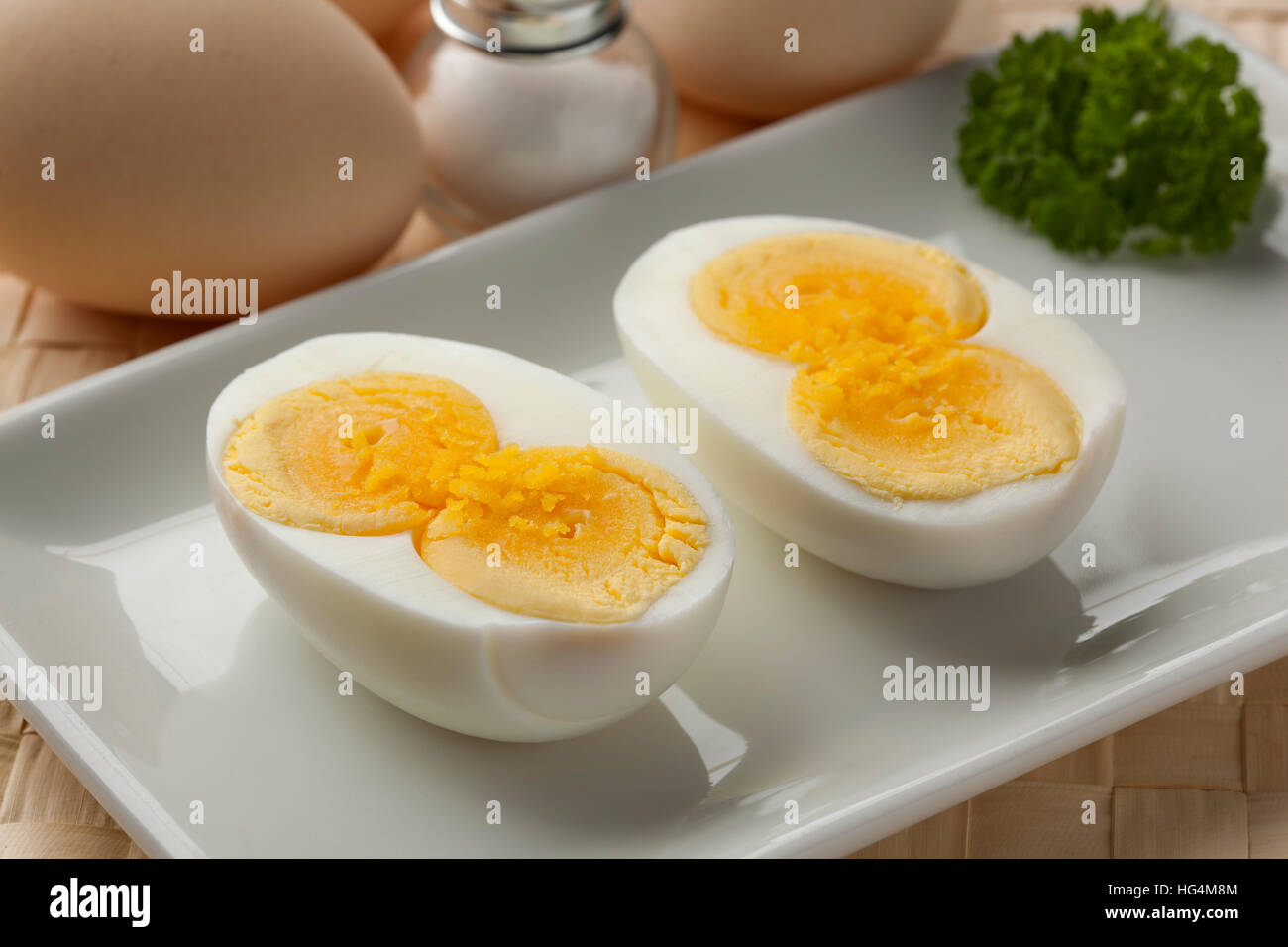 Cooked double yolk egg on a dish Stock Photo