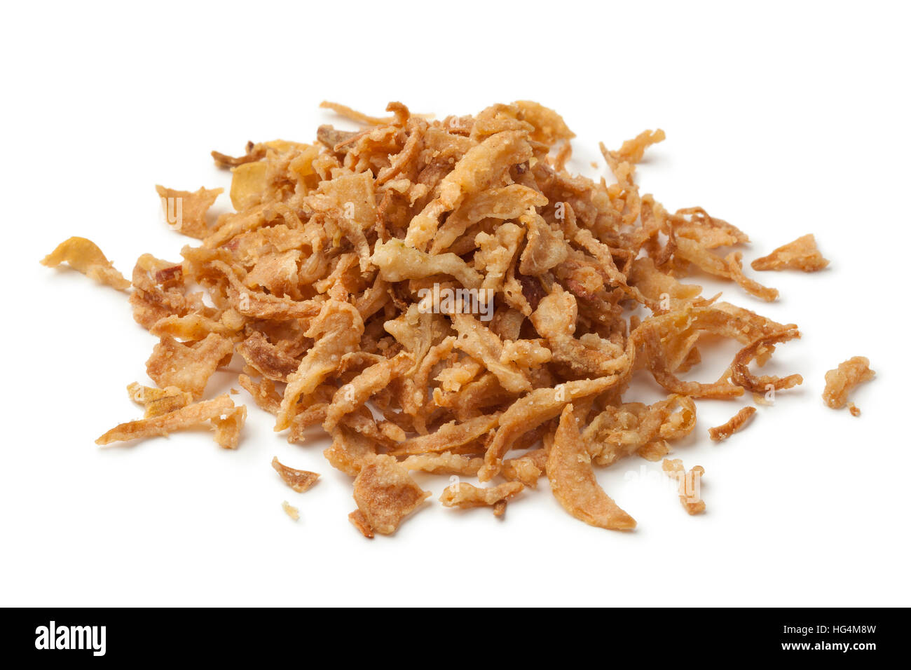 Heap of baked onions isolated on white background Stock Photo