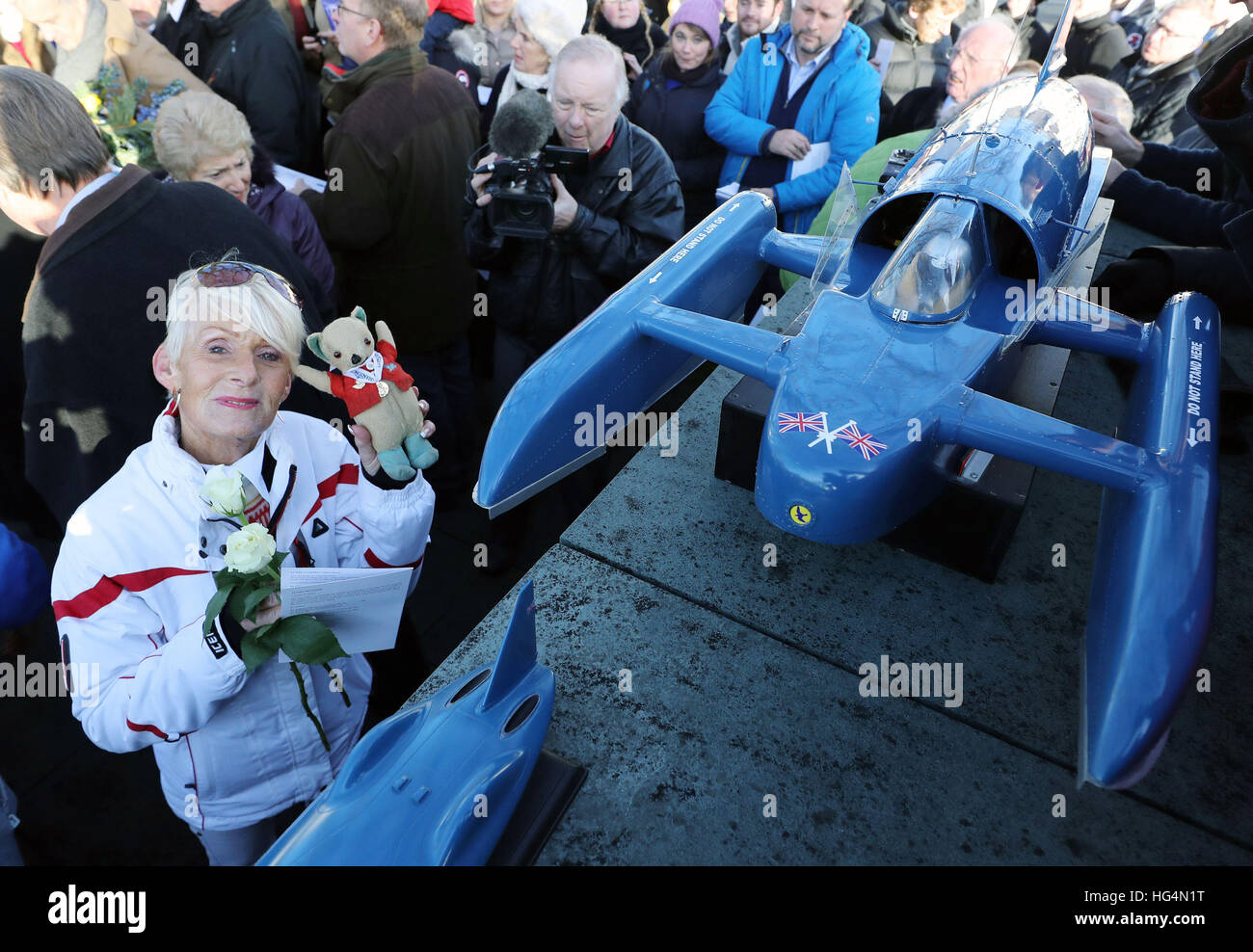 Gina Campbell, the daughter of world land and water speed record holder Donald Campbell, holds