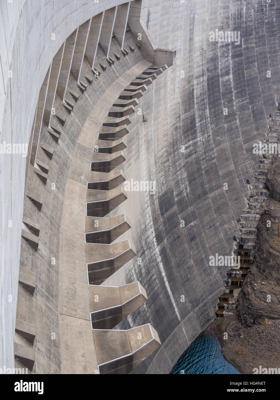 Concrete dam wall and overflow of impressive Katse Dam hydroelectric