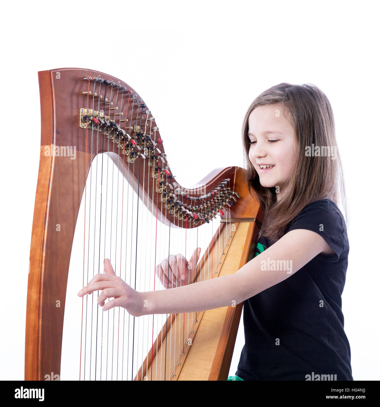 Child playing harp hires stock photography and images Alamy