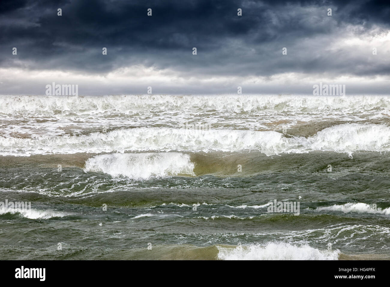 Stormy dark clouds in the sky over rough sea Stock Photo - Alamy