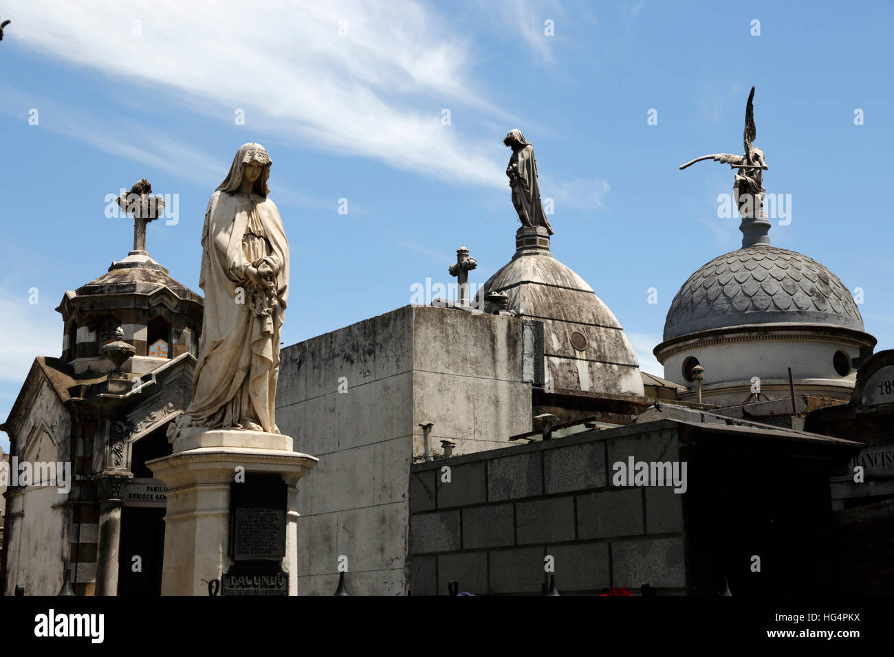Stone angels on roofs of family mausoleums in the Cementerio de la Recoleta, Buenos Aires, Argentina, South America Stock Photo