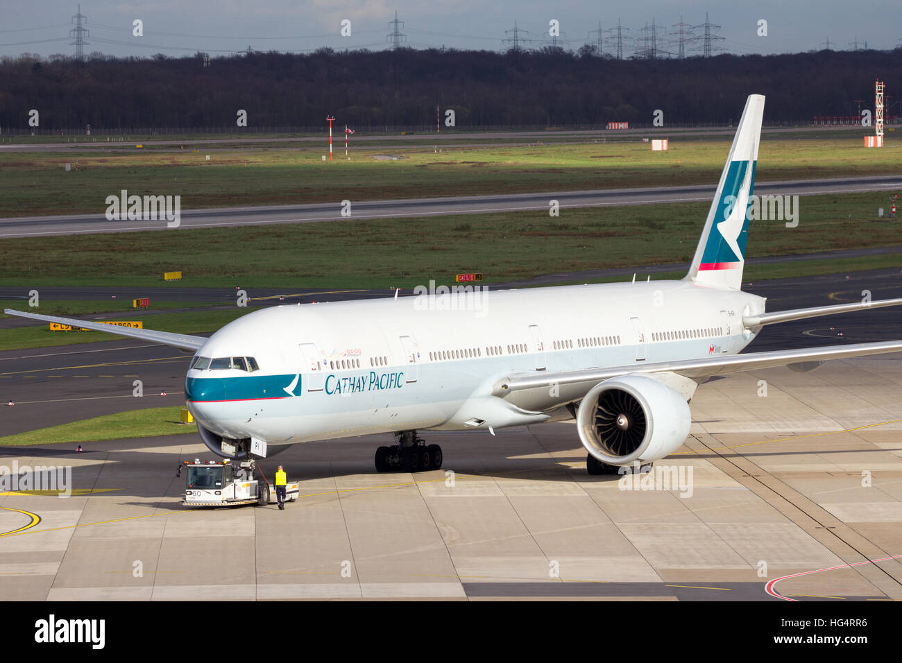 Cathay Pacific Boeing 777-367(ER) airliner on the tarmac of Dusseldorf Airport. Stock Photo