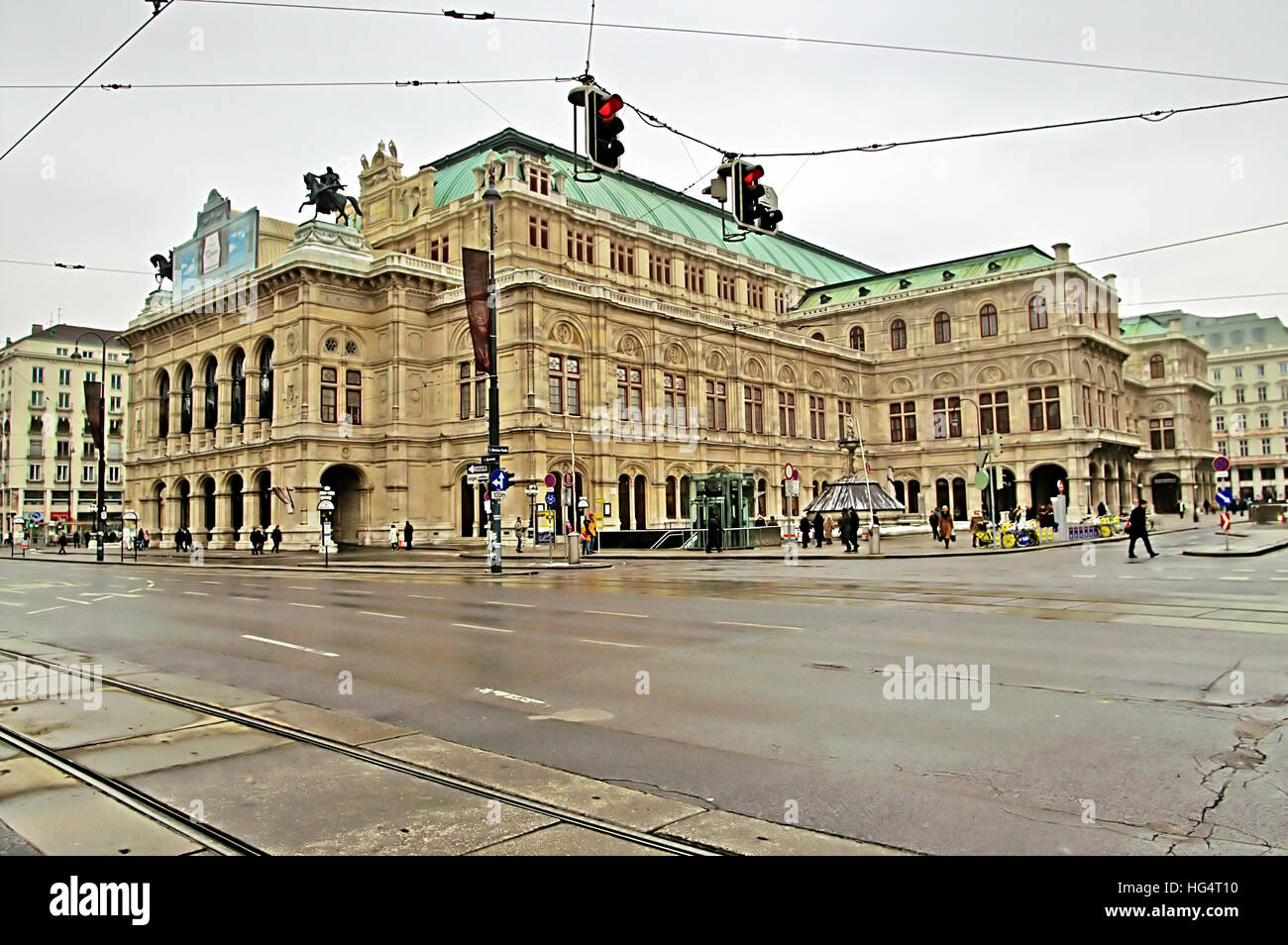 People watching open air live Opera outside the State Opera House in  Karajan Platz Vienna in Austria Stock Photo - Alamy