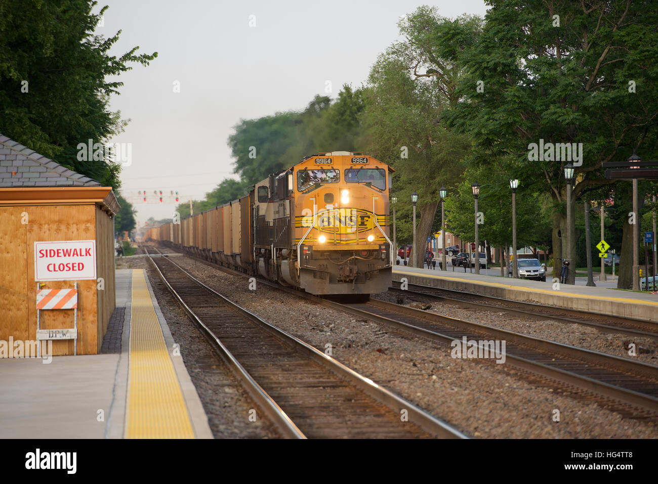 BNSF powered coal train at Stone Avenue Station, La Grange, Chicago, Illinois, USA. Stock Photo