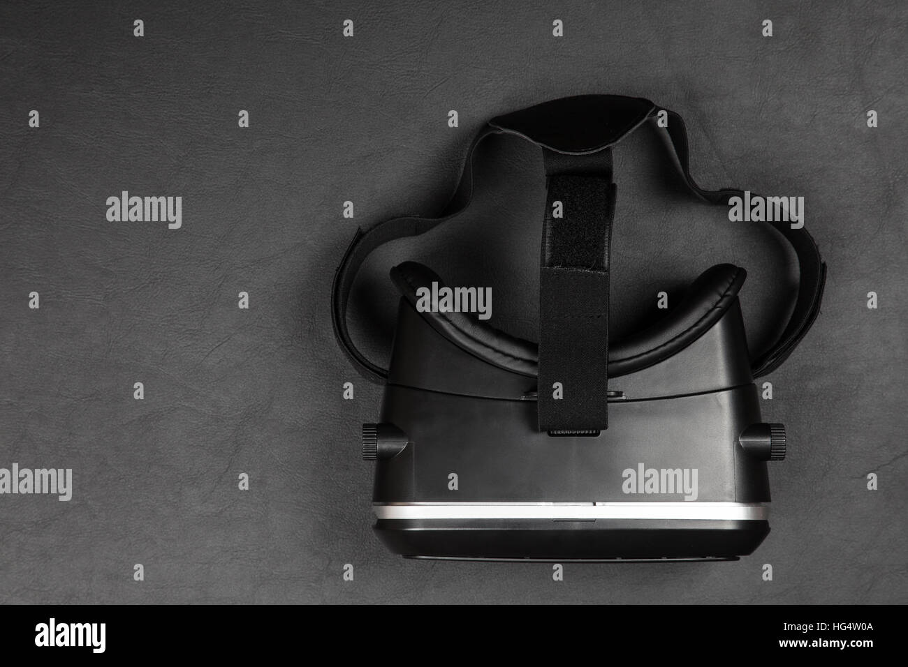 Virtual reality headset on black background Stock Photo - Alamy