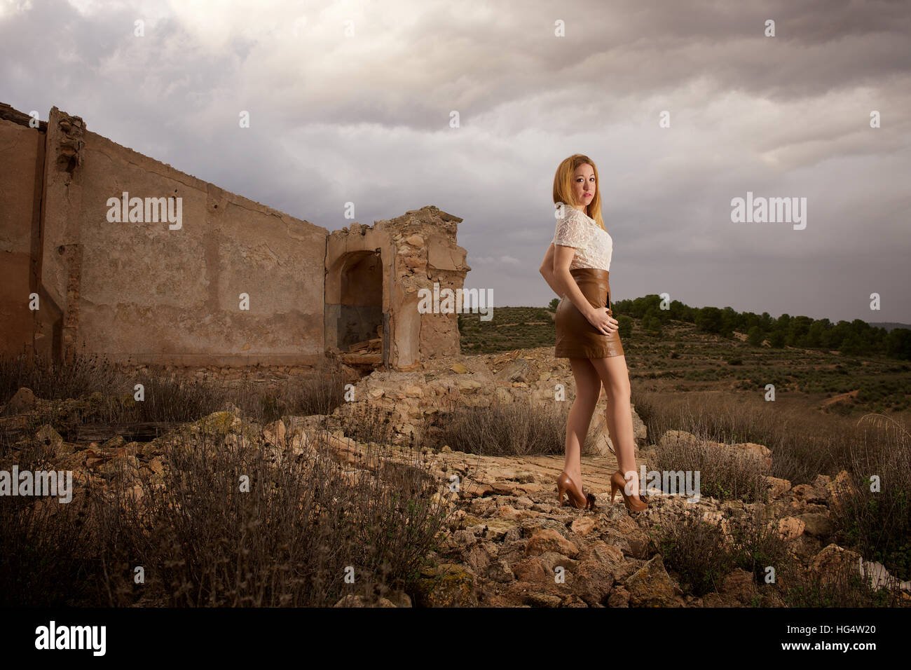Young woman wearing short skirt hi-res stock photography and images - Alamy