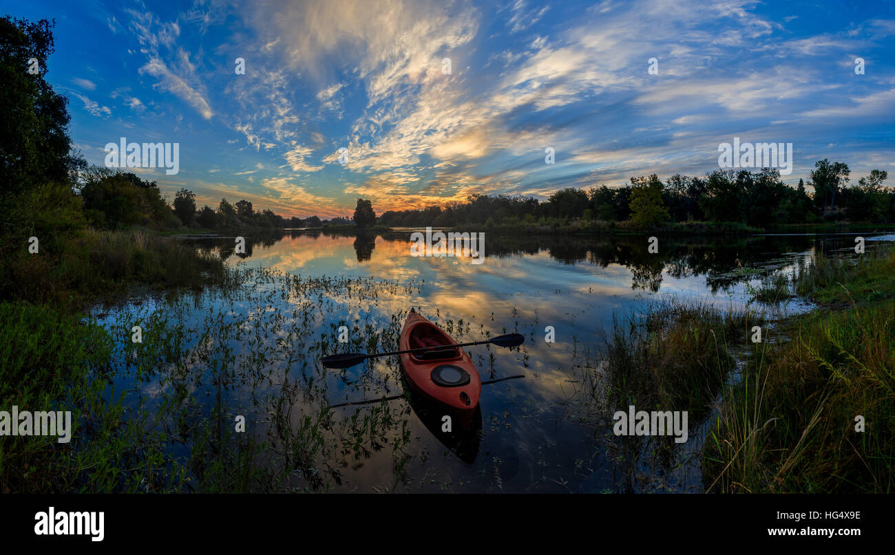 Kayak at Sunrise, American River, Sacramento, California Stock Photo
